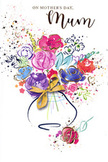 This Mother's Day card illustration presents a joyful burst of watercolour flowers, as if a spring bouquet had been captured in mid-bloom and framed on soft white paper. Lush purples, playful pinks, and radiant reds cluster at the centre, their loose petals edged with deep indigo lines that give just enough shape without losing the dreamy, painted feel. Cool washes of blue and touches of lavender offer a calming contrast, while fresh greens peep through like new leaves along the gardens and front paths of Barkingside. Fine glints of gold trace selected petals and stems, adding a gentle, celebratory sparkle that feels like sunlight catching on a ribboned bouquet just delivered to the door. The flowers gather in a rounded vase at the base, graceful and understated, finished with the suggestion of a golden bow that evokes the crinkle of wrapping and the anticipation of surprising Mum. Around the bouquet, flecks of colour and tiny heart shapes drift outward, resembling scattered petals or confetti tossed in quiet celebration. Every element suggests the care of a florist used to arranging hand-tied designs for local families, balancing bold colour with softer notes so the whole composition feels airy yet heartfelt. The card's mood is warm and affectionate, capturing the essence of saying thank you on Mother's Day - not with words alone, but with an image that radiates love, appreciation, and the comfort of being thought of.